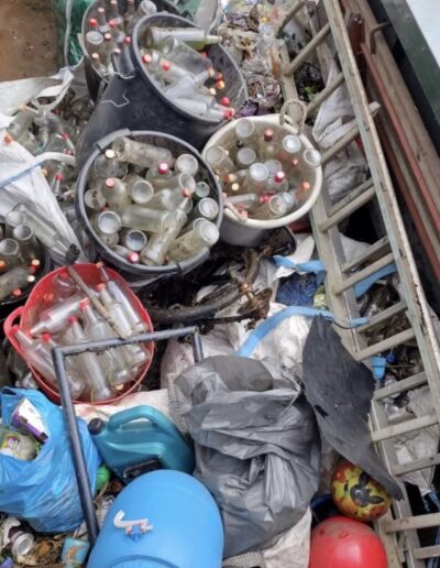 Debris collected from the canal, bottles and plastic